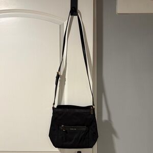 Michael Kors Black Crossbody Bag with Gold Accents